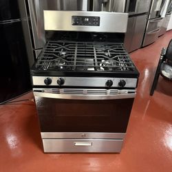 GE 4-burner gas stove in perfect working condition. Delivery and installation available with a 3-month warranty.