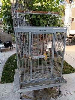 Large Rolling Parrot/Bird Cage with Playtop – $200 OBO
Large heavy-duty bird cage with rolling casters and playtop stand.
