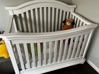White crib with mattress