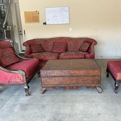 Gorgeous Antique Living Room Set. Sofa, Lounge Chair, Ottoman and Trunk Style Coffee table.