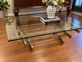 Modern Glass Coffee Table with Silver Metal Base.