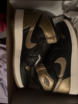 NEW IN BOX JORDAN 1s BLACK AND GOLD SIZE 6.5y