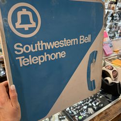 18x18 flange double sided Metal SOUTHWESTERN BELL TELEPHONE SIGN. 125.00.  Johanna at Antiques and More. Located at 316b Main Street Buda. Antiques vi