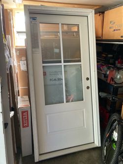 New entry door , fiberglass ,  left in swing , 36 by 80