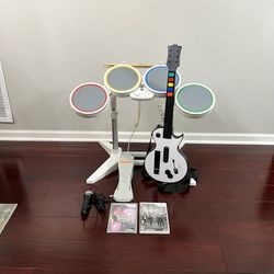 Nintendo Wii Rock band 1 and Guitar Hero  Game Bundle ( wired drums, guitar, pedal and 2 games) TESTED
