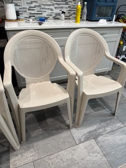 White Plastic Stackable Chairs with Cane-Style Back