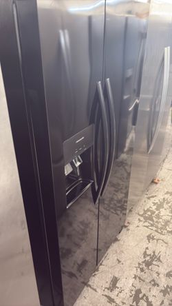 Frigidaire Side By Side Refrigerator in gloss black