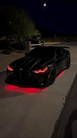 Black BMW (redheadlights)