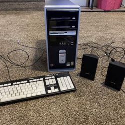 Compaq computer tower keyboard and speakers 