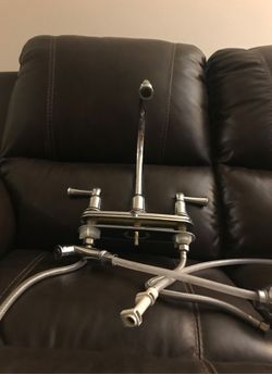 Fauset with water sprayer