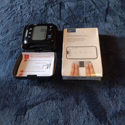 Blood Sugar Machine And A Heart Check Machine 