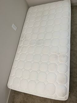 Twin size firm mattress (original price $100).
