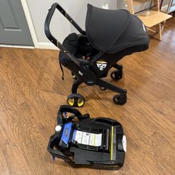 Doona Car seat/Stroller With Base And Inserts 