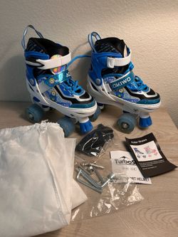 Size 10-13 Child adjustable Roller Skates In Original Dust Bag/Manual/Tools Included Great Condition/Great for Starters