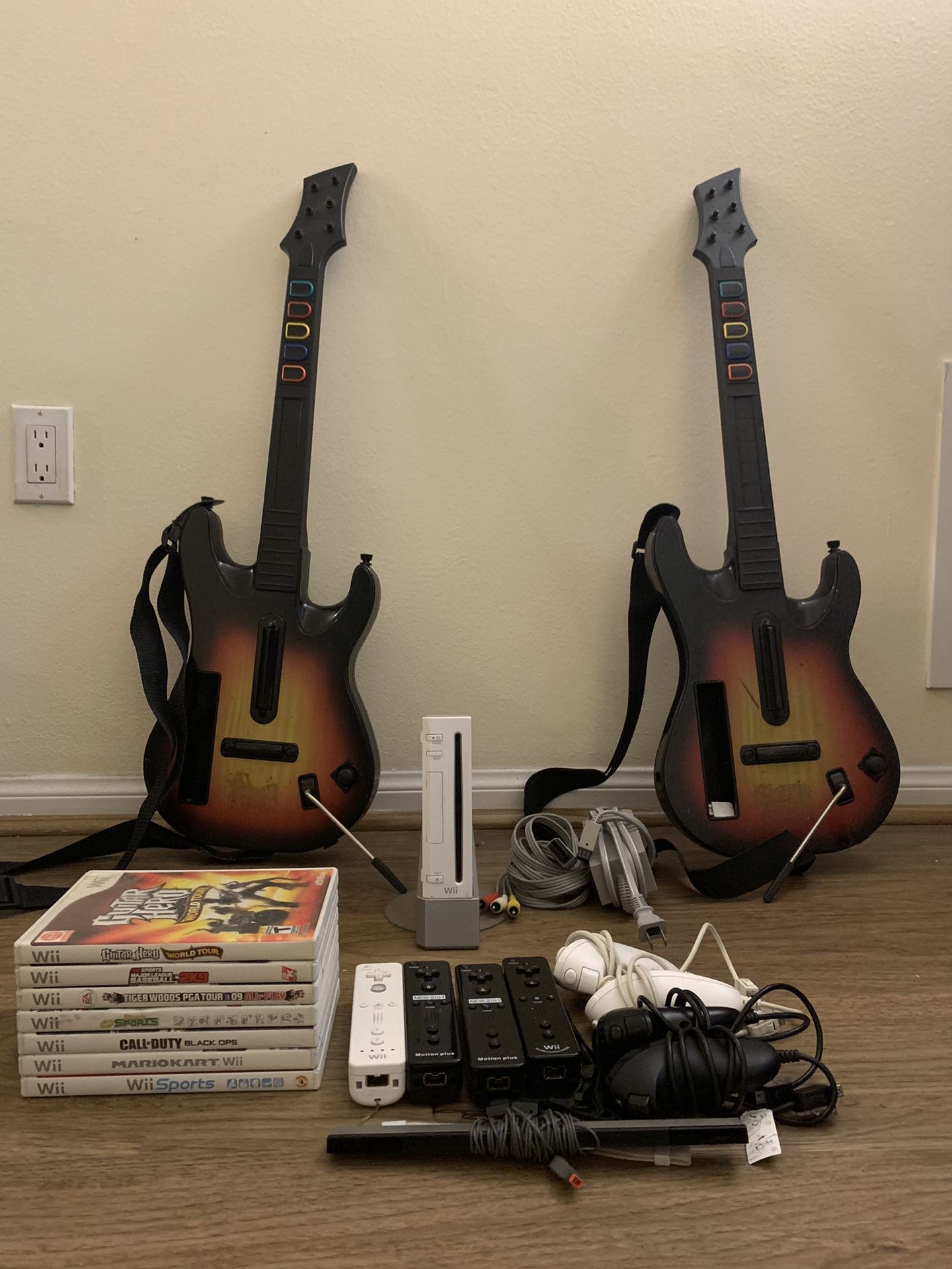 Nintendo Wii Complete Bundle – 7 Games, 4 Remotes, 2 Guitars – $175 OBO