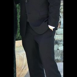Men’s Warehouse Black suit/tuxedo (size 33-34 Slim)