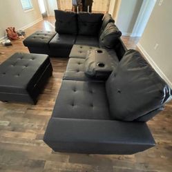 Black L Shape Leather Sectional With Ottoman & Cup Holders 