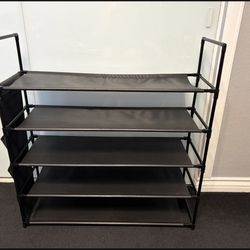 5 Tier Shoe Storage Pre-owned Good Condition.  H 35” W 33 1/2” D 11”