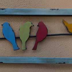 Lightweight metal birds on wire