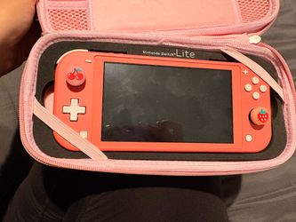 Nintendo switch lite coral