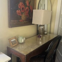 Fabric and suede glass top console table