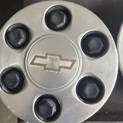 4 Chevy Center Caps.