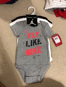 BRAND NEW: Jordan 3 piece onesies size 6-9 Months