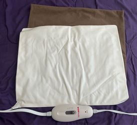 Brand new heating pad