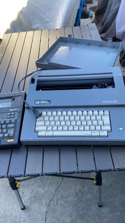 Two typewriters DeVille 80 and Canon