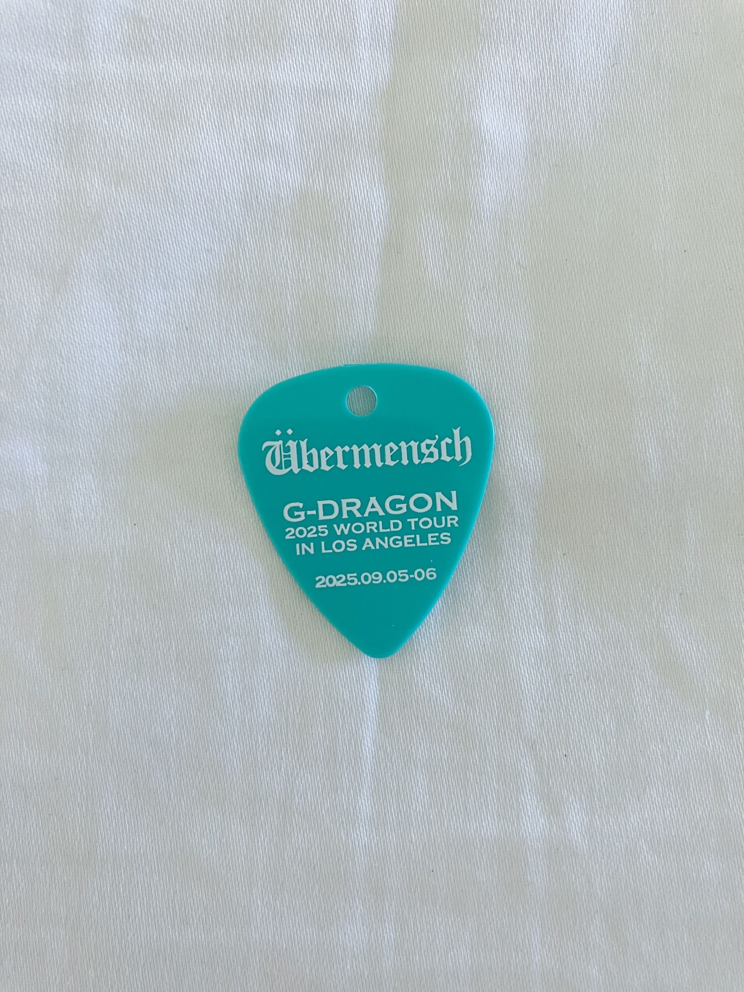 Kwon Jiyong G-DRAGON Ubermensch World Tour Los Angeles 2025 teal guitar pick