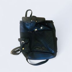 black backpack made of imitation leather.