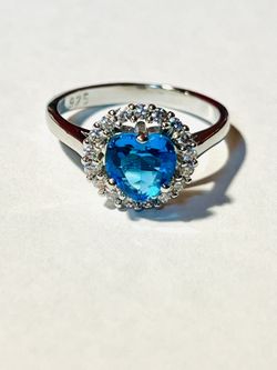STERLING SILVER.925 STAMPED SWISS BLUE TOPAZ AND CZ RING 
