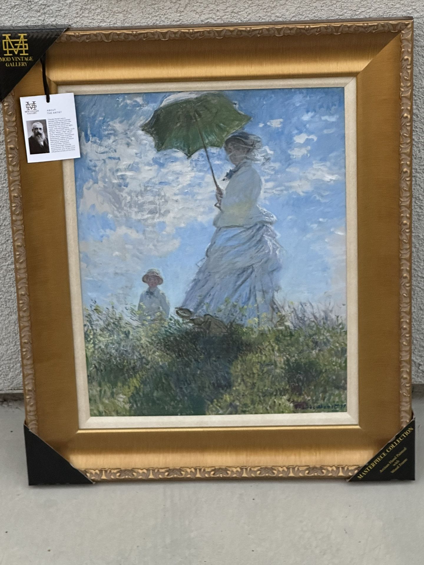 Women with a parasol madame Monet and her son painting by Claude Monet.