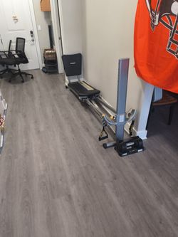 Total gym With Barbell