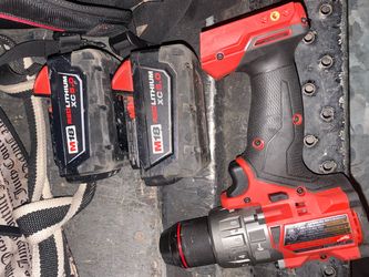 Milwaukee fuel drill X two batteries