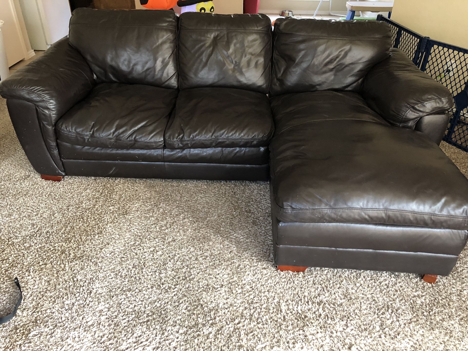 Dark chocolate leather sectional couch