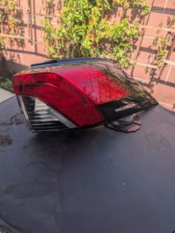 OEM passenger side (right rear) outer tail lamp assembly for a Toyota RAV4 (5th Generation, model years 2019–2024