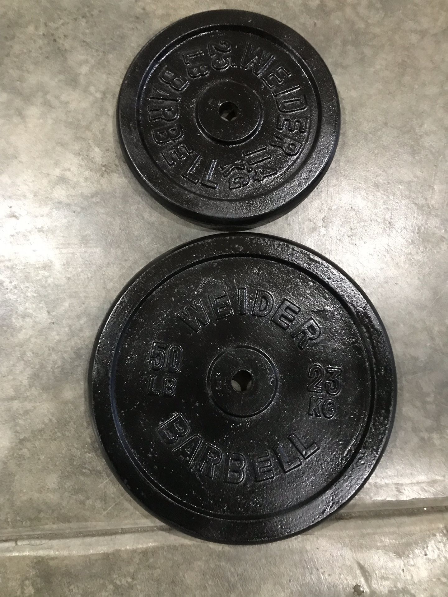 75lb of Standard weight 1-50lb & 1-25lb