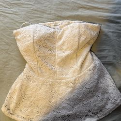 White baby doll top, tube top with flare at the end ambiance appeared size Small
