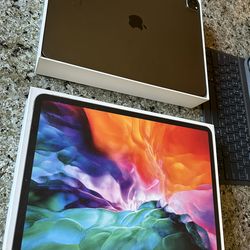 iPad Pro 12.9 Inch 4th Gen 256gb WiFi Only With Box And Logitech Keyboard And Screen Protector