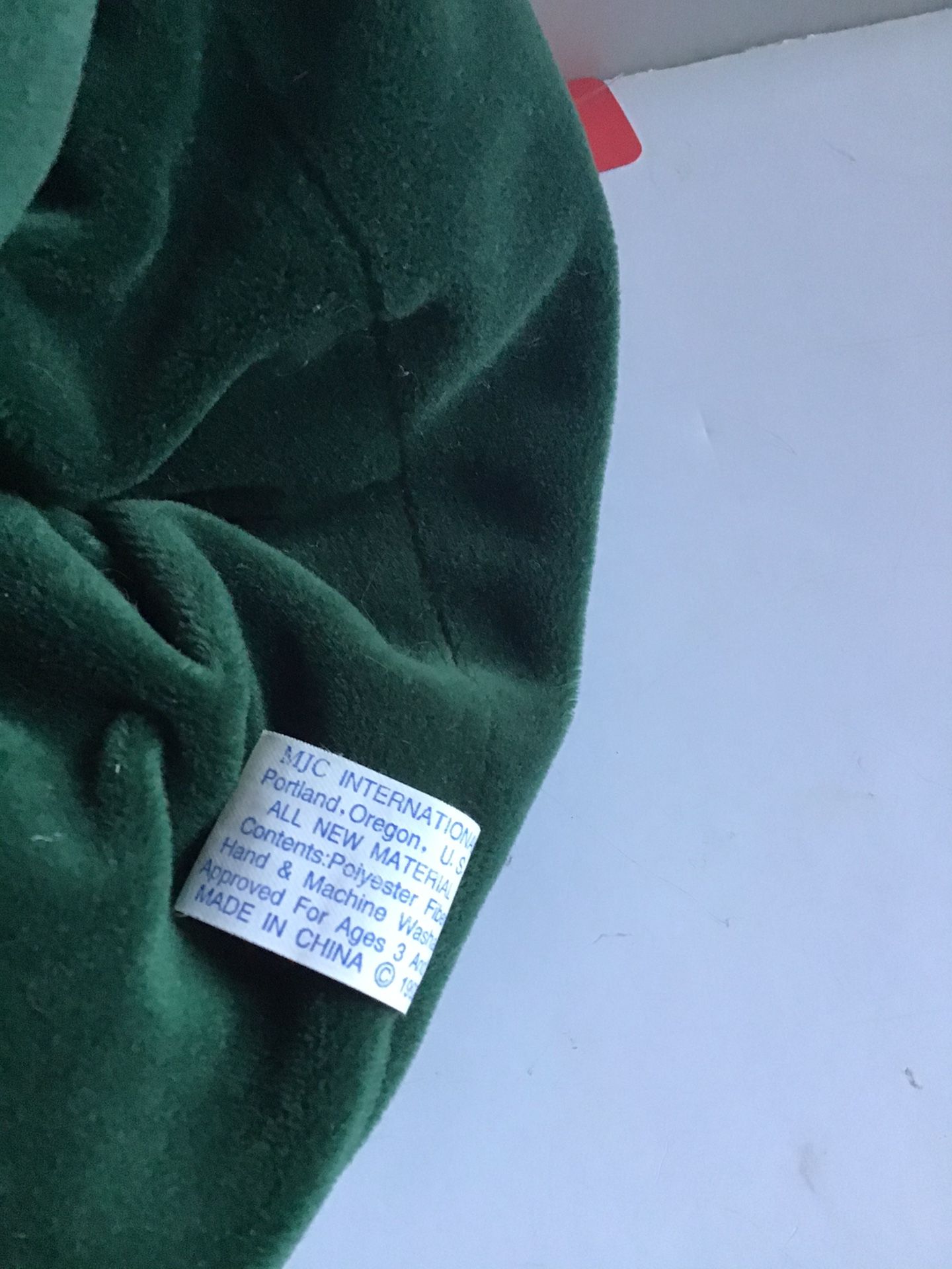 STUFFED BEAR IN GREEN DRESS W/ LACE COLLAR