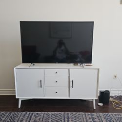 TCL 55" Roku TV with White TV Stand