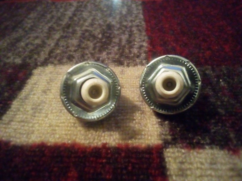The image shows a knock sensor, an essential component in modern internal combustion engines. It detects engine knocking or detonation, which is a met