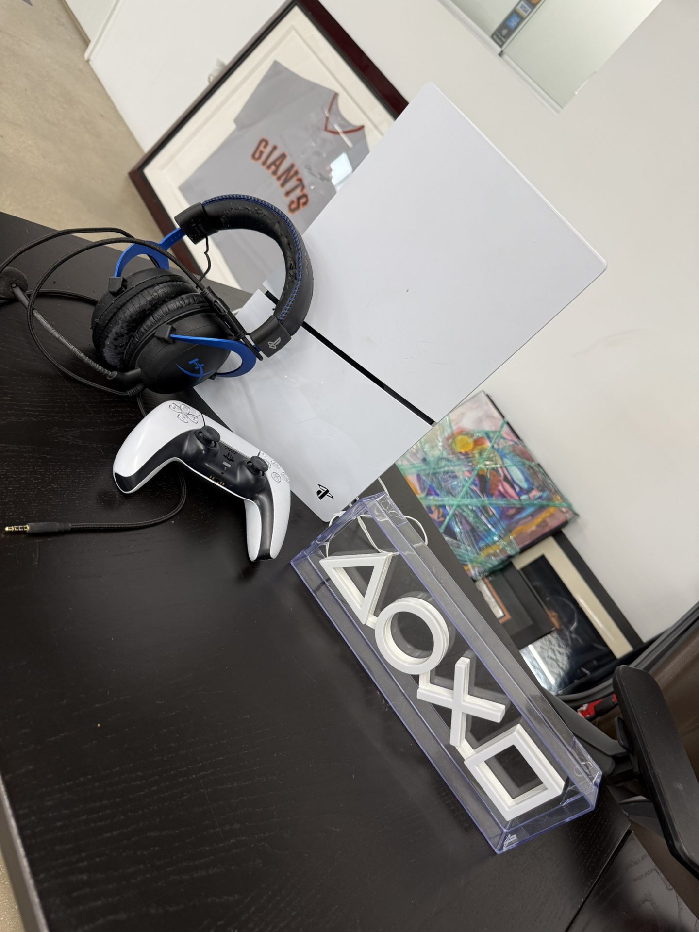 The image shows a Sony PlayStation 5 Slim Digital Edition console, accompanied by a HyperX Cloud II Gaming Headset and a DualSense wireless controller