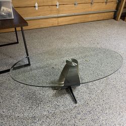 Oval Glass Coffee Table With Silver Base