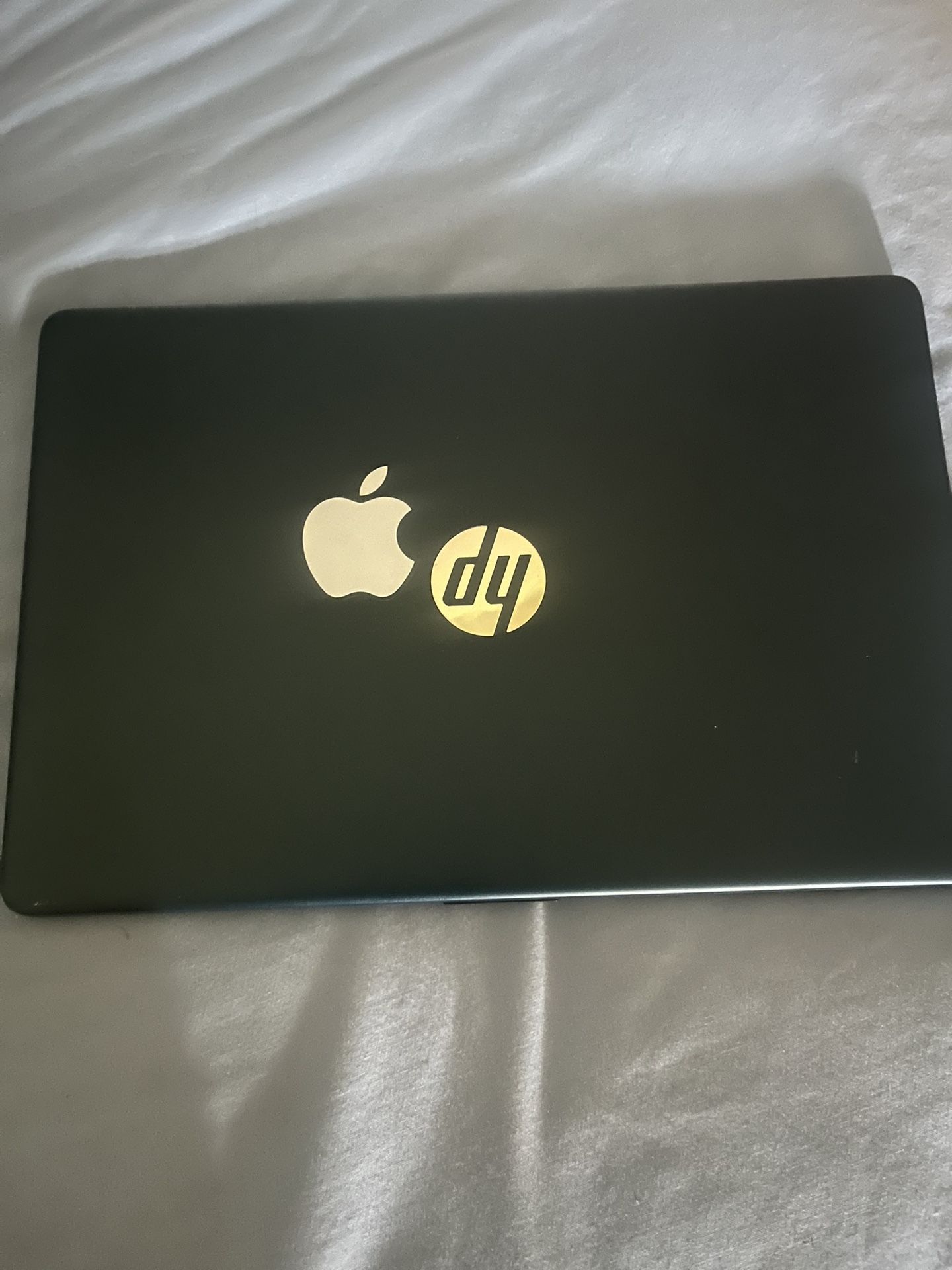 HP 15.6" Laptop (apple logo is jus a sticker)