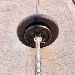 Barbell Bar ..plus Weights 50 lbs…I’m Located In Bayside Queens 
