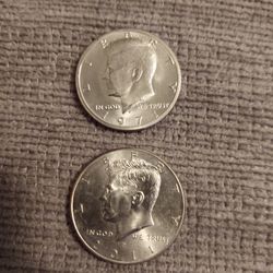 Kennedy Half Dollars And $20 Star Note