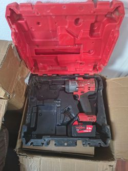 Used Milwaukee impact + battery and case