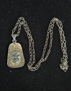 Vintage sterling silver double sided pendant necklace, the Olmec Warrior and the Aztec calendar